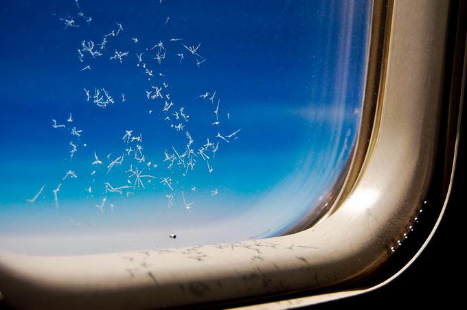 Frost on plane window